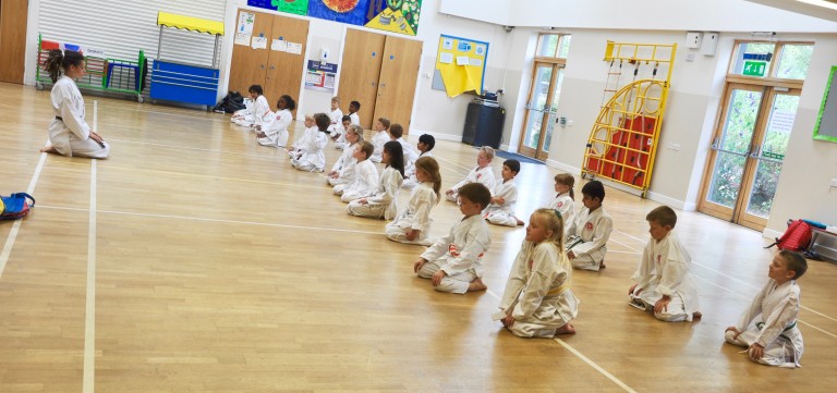 Children meditating at Coppice School before class